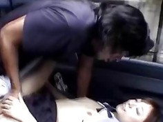 Filthy Japanese schoolgirl sucks a rod in back seat